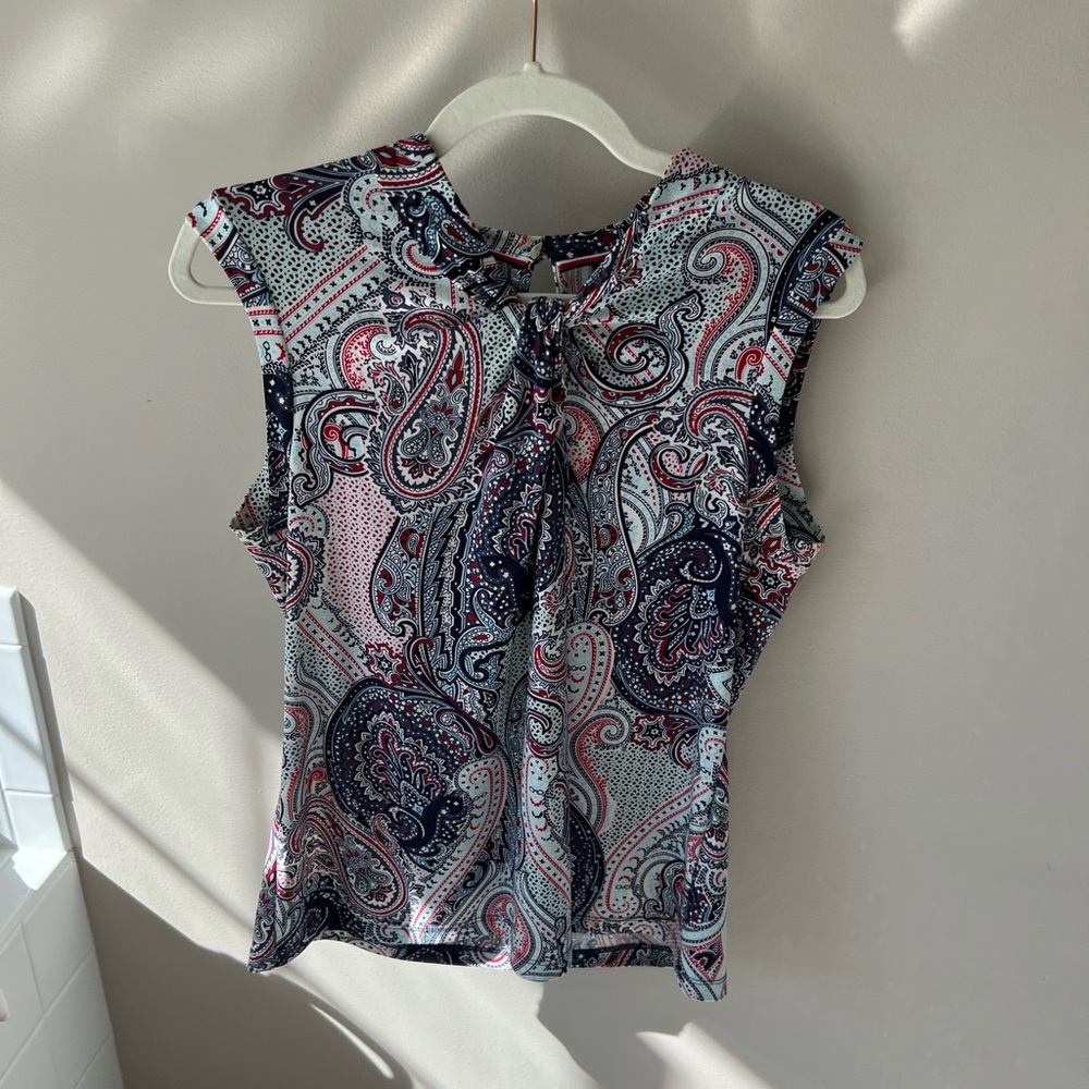 Blue, red, and white pattern on a size M women’s tank top